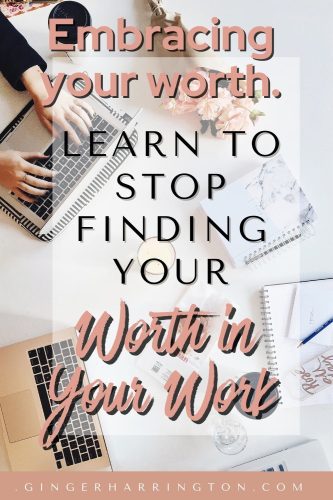 Flat lay photo includes a woman's hands typing on laptop and other desk items 