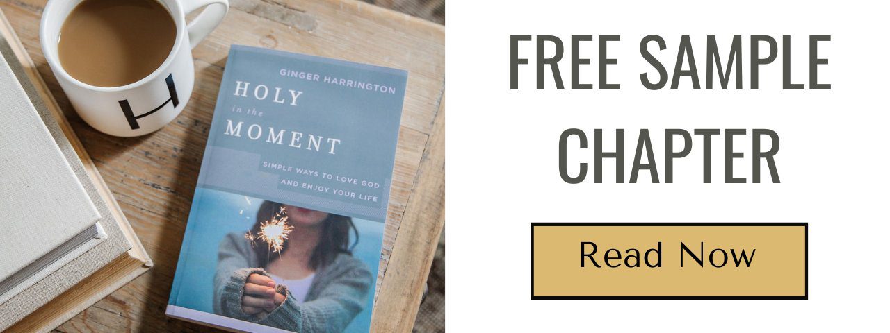 Book Holy in the Moment displayed on wooden table